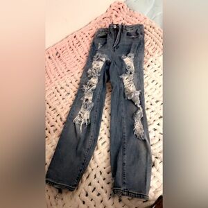 size 0 ripped denim jeans